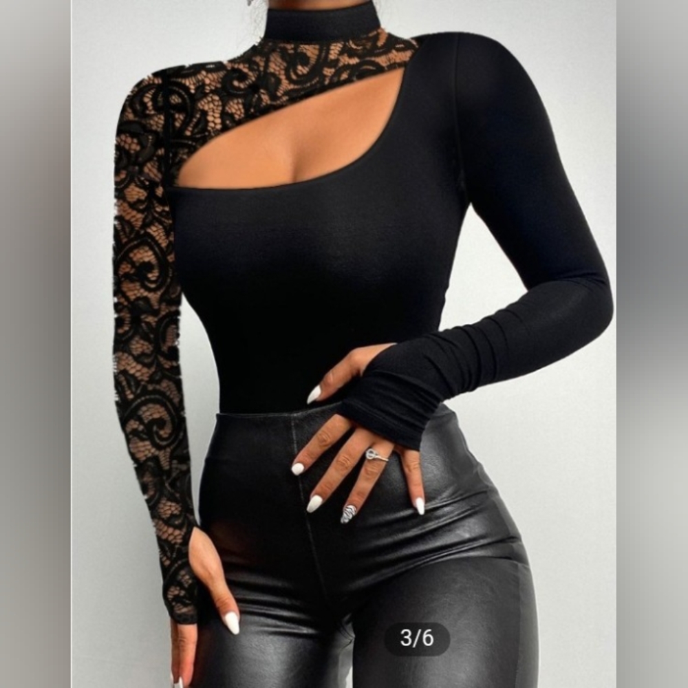 NEW, Sexy, Elegant & Chique All Rolled Into One Blouse!